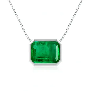 Emerald-cut emerald pendant in white gold bezel setting
